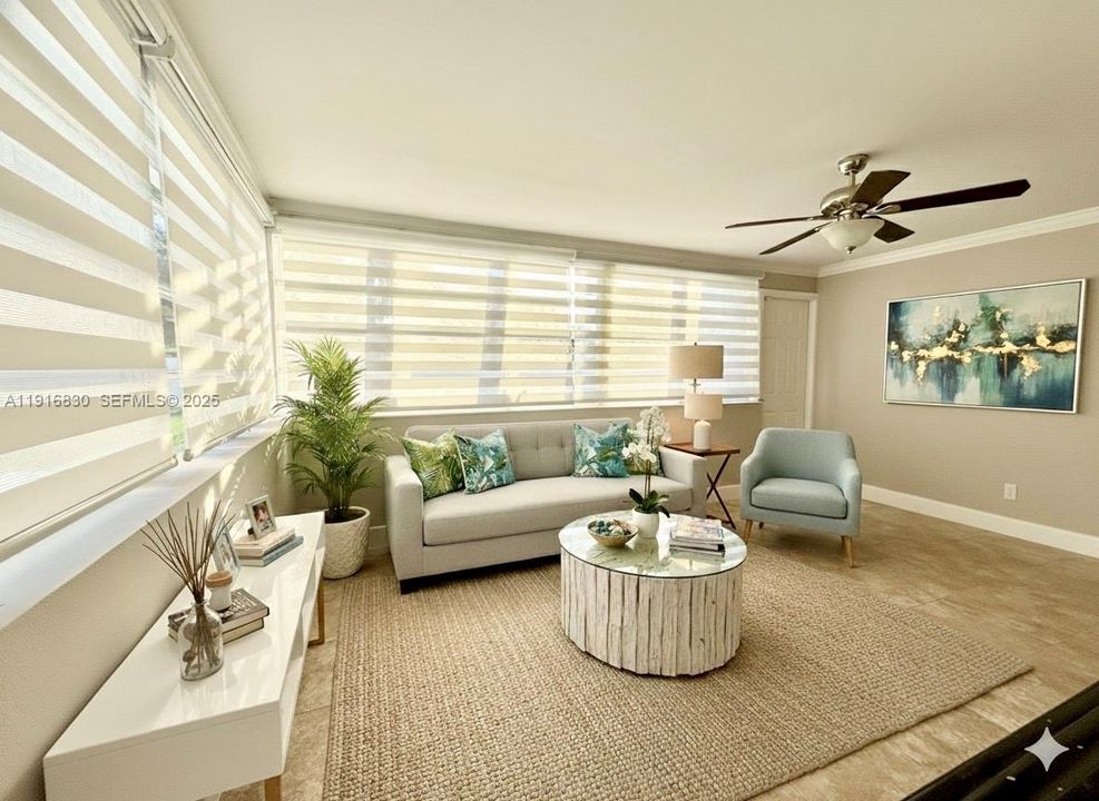 Large florida room with access to the backyard.VIRTUALLY STAGED