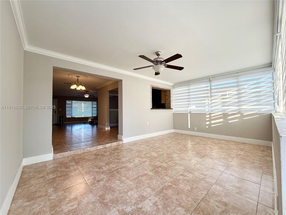 Large florida room with access to the backyard.