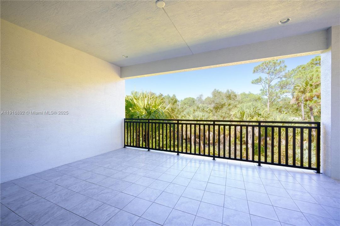 Covered large balcony with space for multiple uses