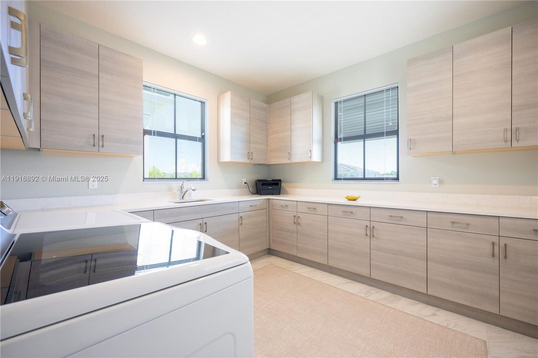 Additional laundry room upstairs for convenience and comfort