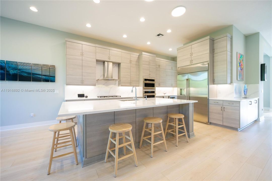 Expansive island with ample bar seating