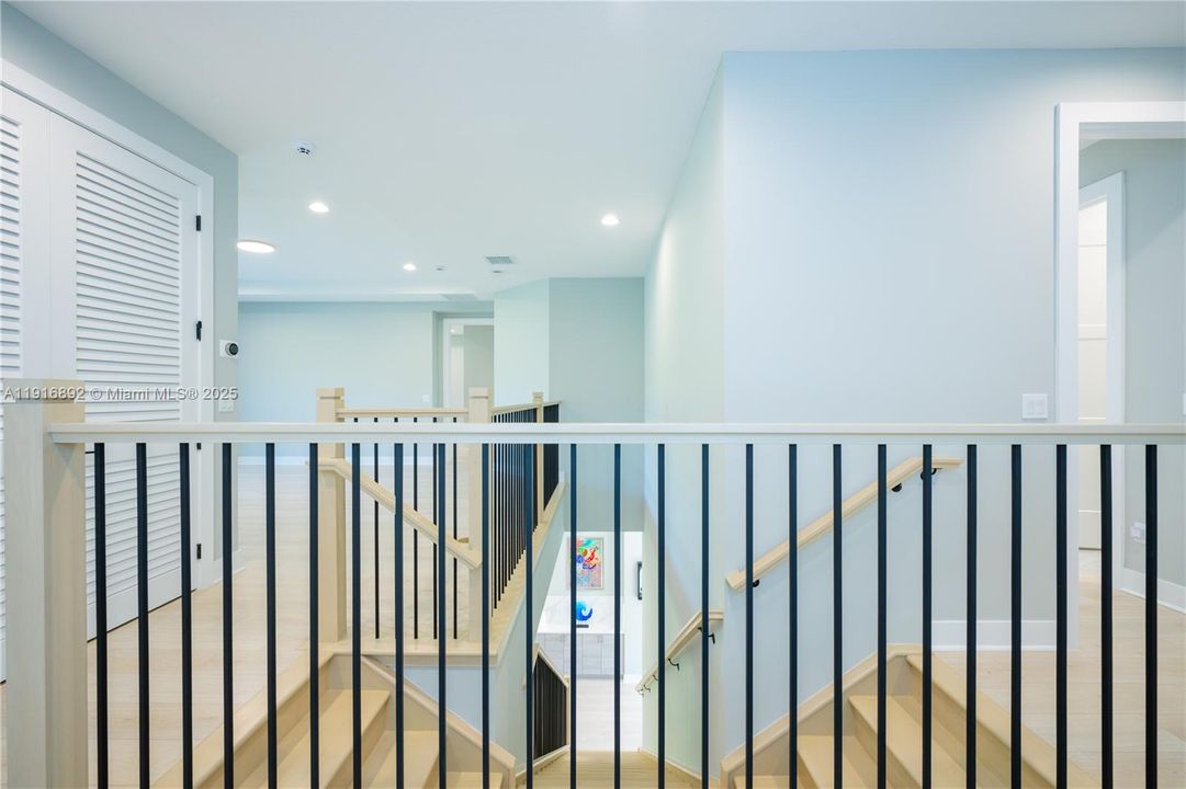 Landing area overlooking the stairs and loft area