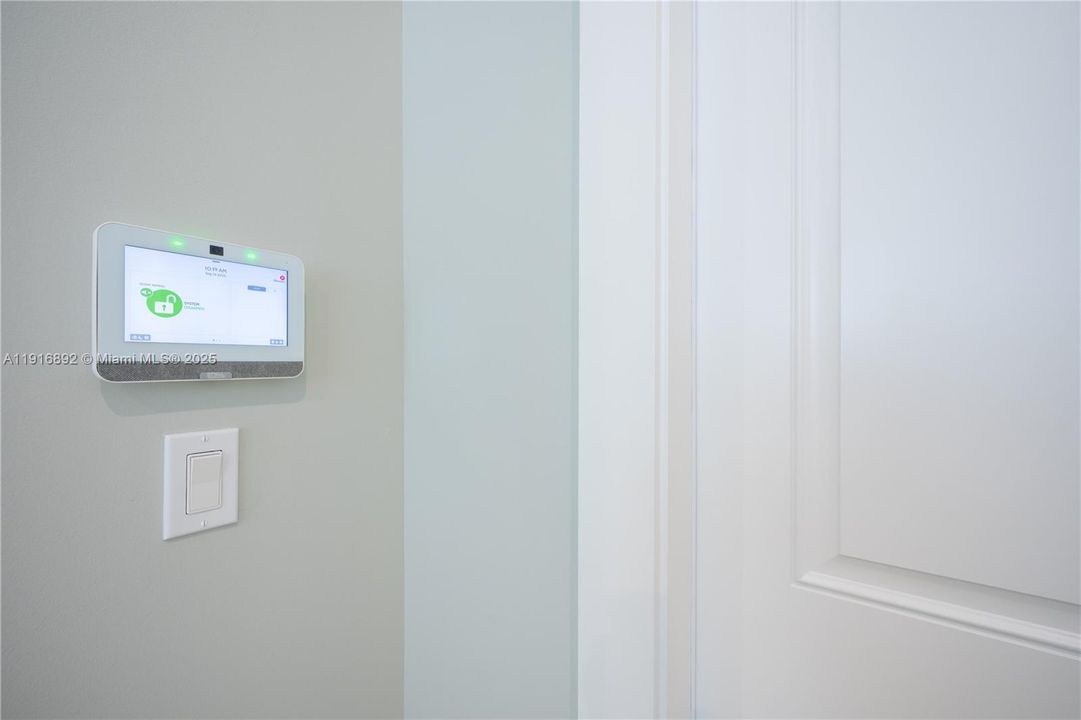 Alarm.com HD video security system with 3 cameras