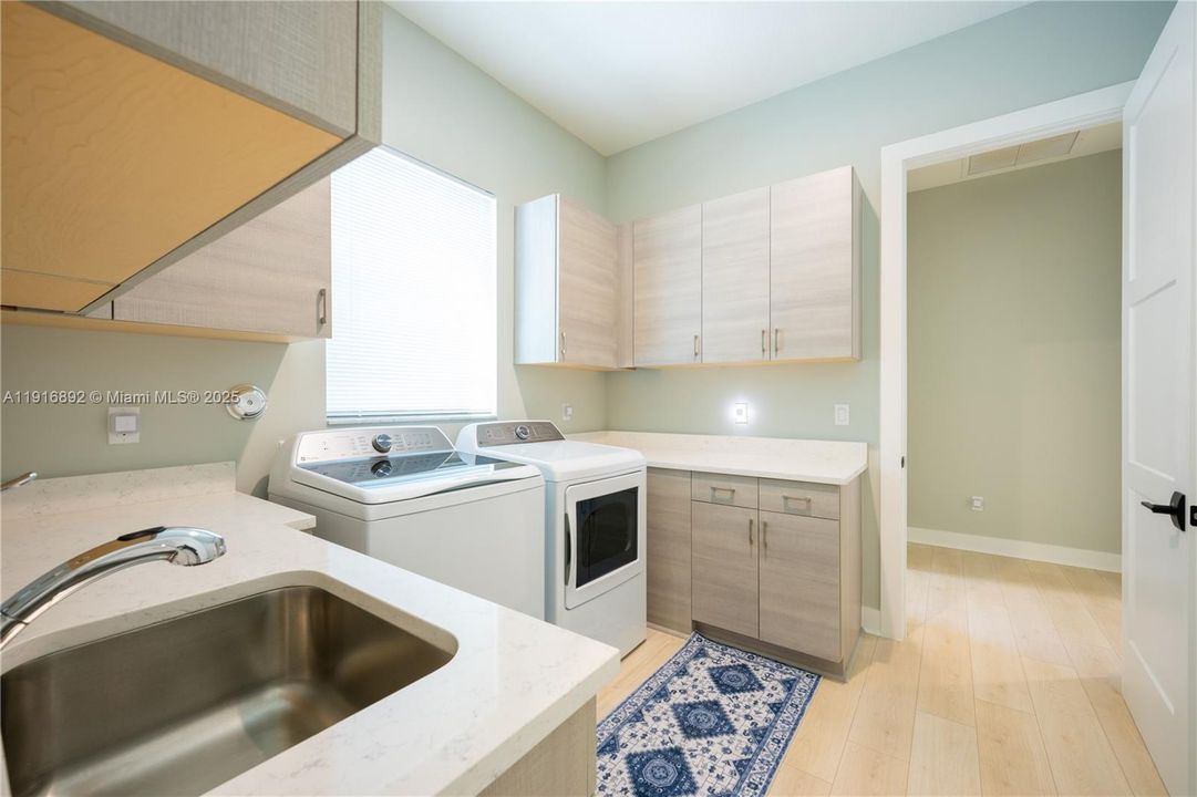 Downstairs deluxe laundry room