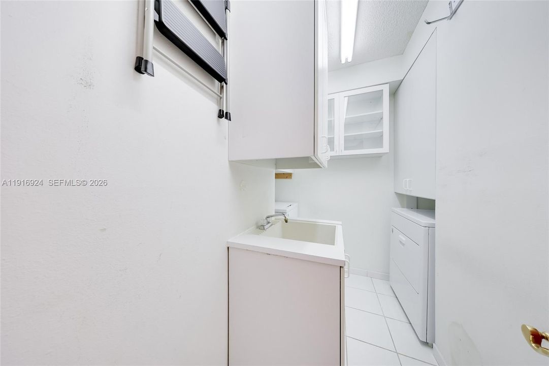 Large Laundry Room with Laundry Sink