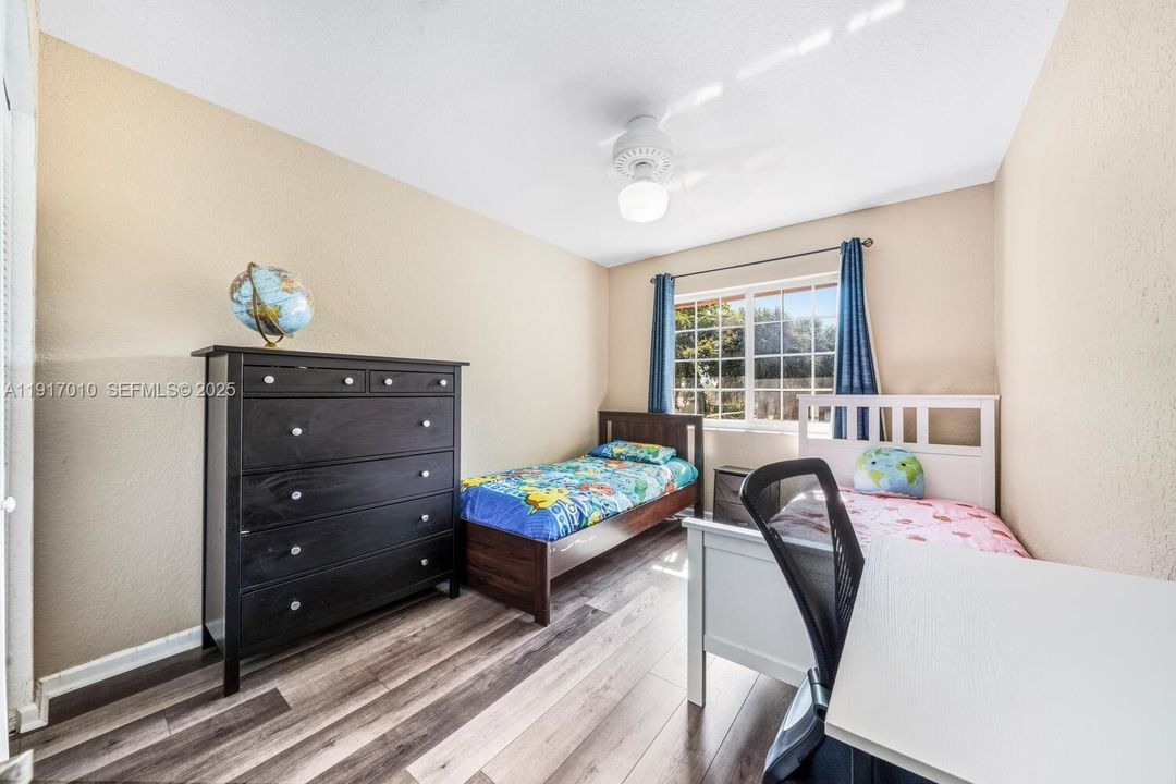 Front Facing Bedroom with new vinyl wood floors!