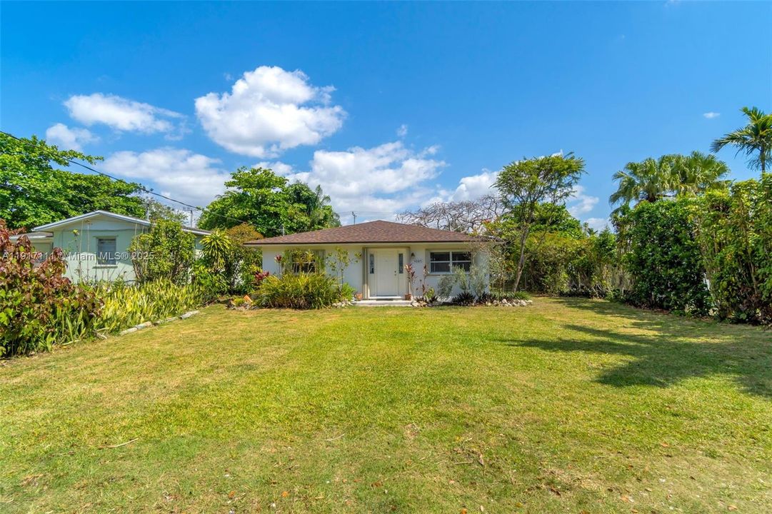 LARGE FRONT YARD SITTING OFF THR ROAD... GREAT AREA TO LANDSCAPE OR ROOM TO GROW..