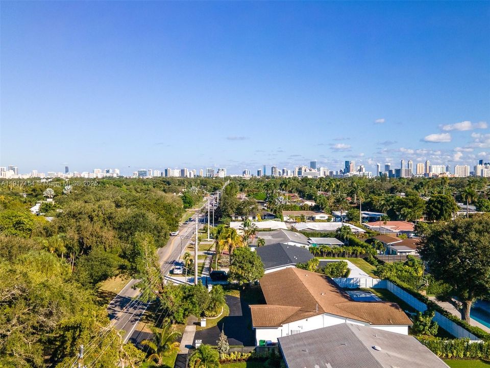 Aerial perspective showing proximity to Aventura skyline and surrounding residential neighborhood.