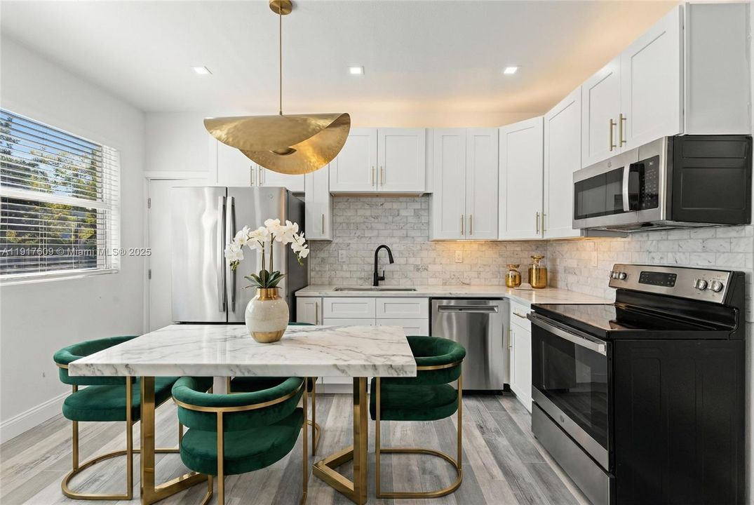 Virtually staged kitchen in 5820 nw 3rd Ave