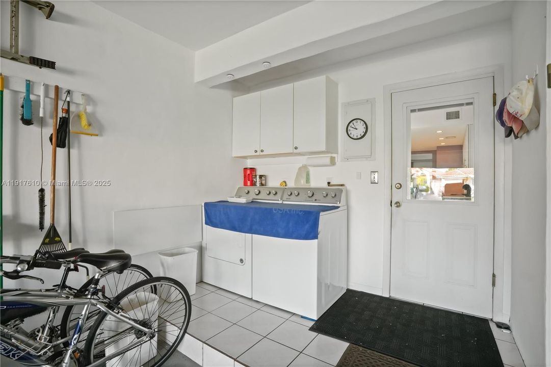 Large 2-car garage with washer/dryer & large attic!