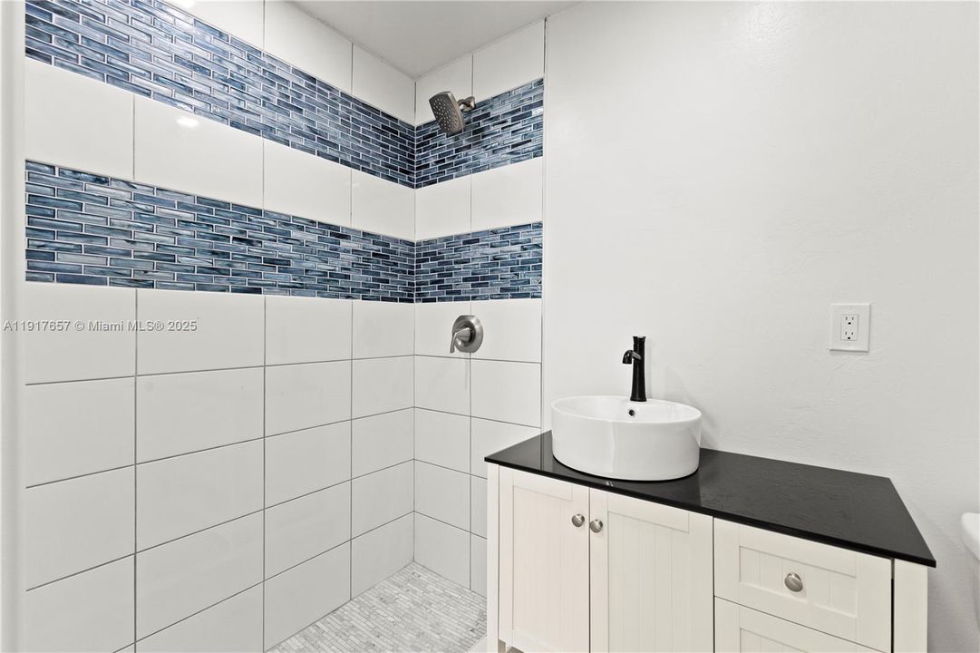 Full bathroom. Each unit has 2 full bathrooms and a half bath