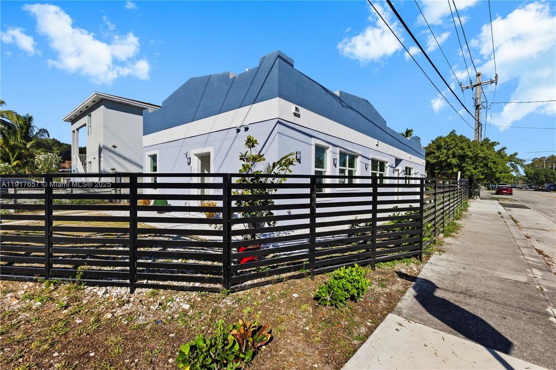 Fence near 305 NW 58th St entrance
