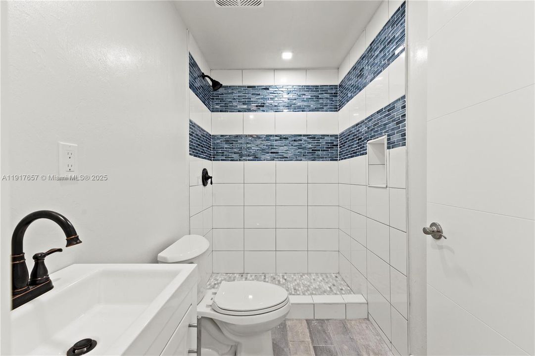 Full bathroom. Each unit has 2 full bathrooms and a half bath