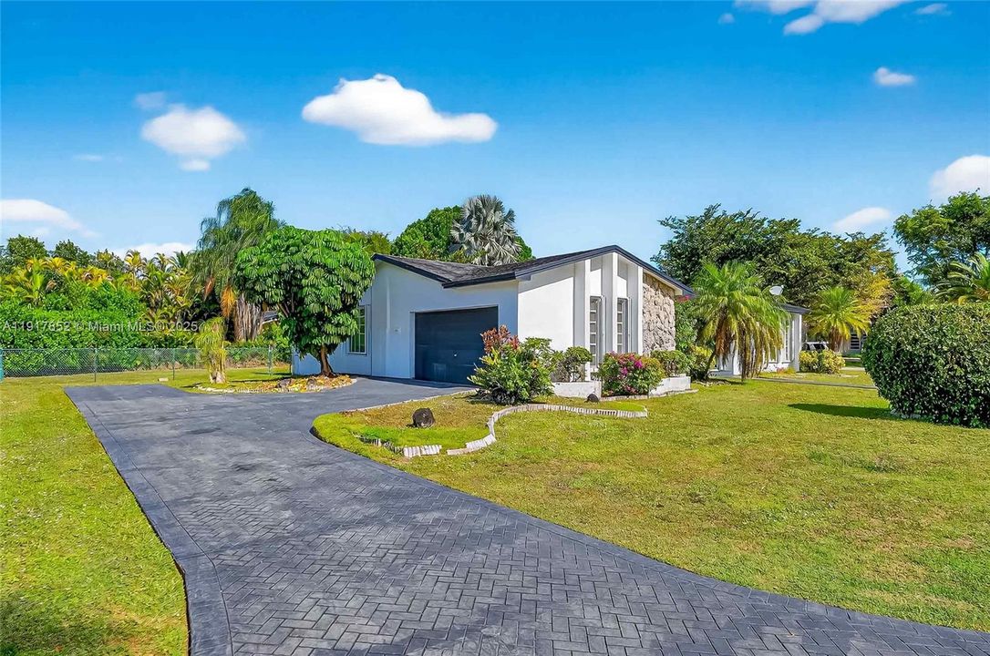 Side of house, garage, long drive way