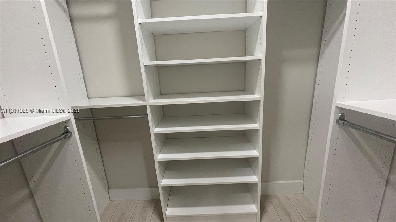 walk in closet in master bedroom