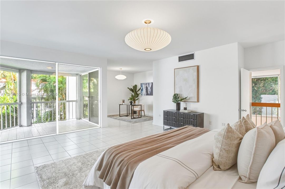 Very large primary bedroom suite is upstairs