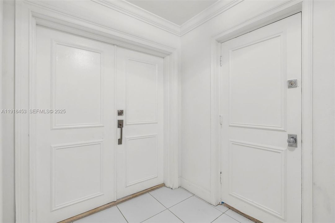 PRIVATE HALL, DOUBLE DOOR ENTRANCE  PLUS SERVICE DOOR TO KITCHEN