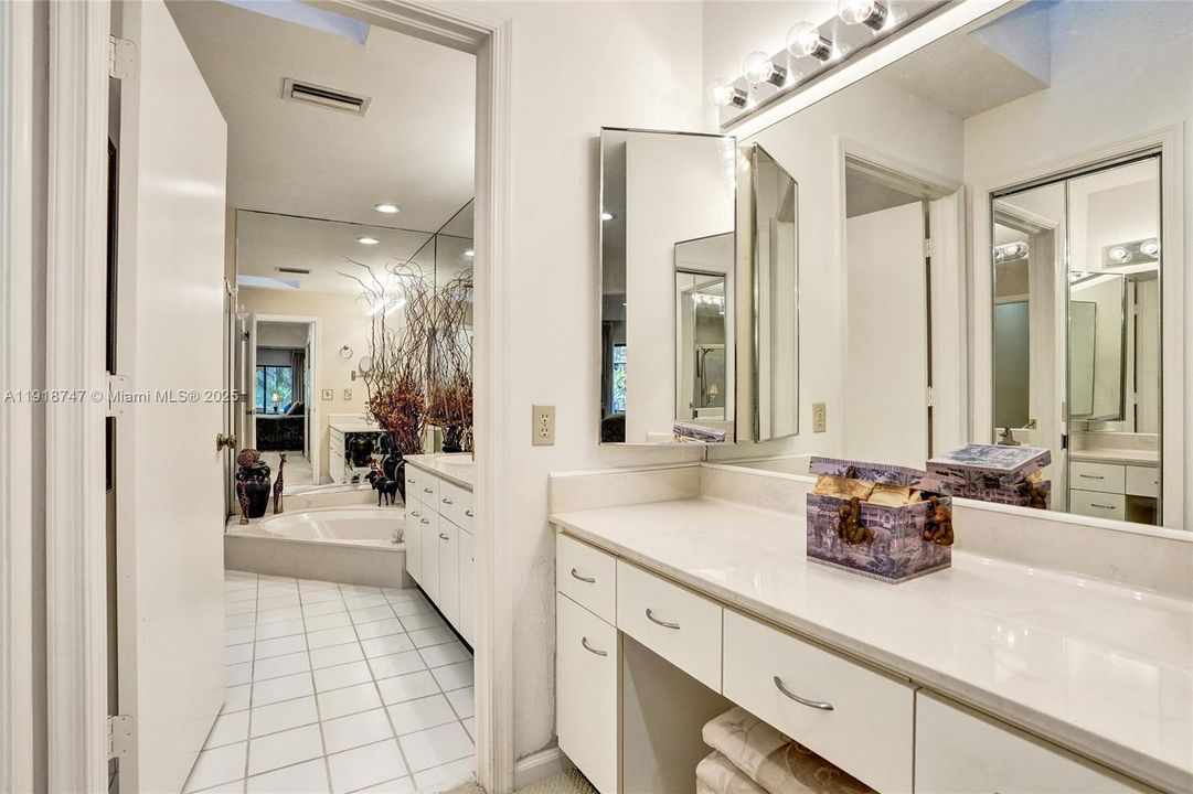 Makeup vanity in the hall before the bathroom
