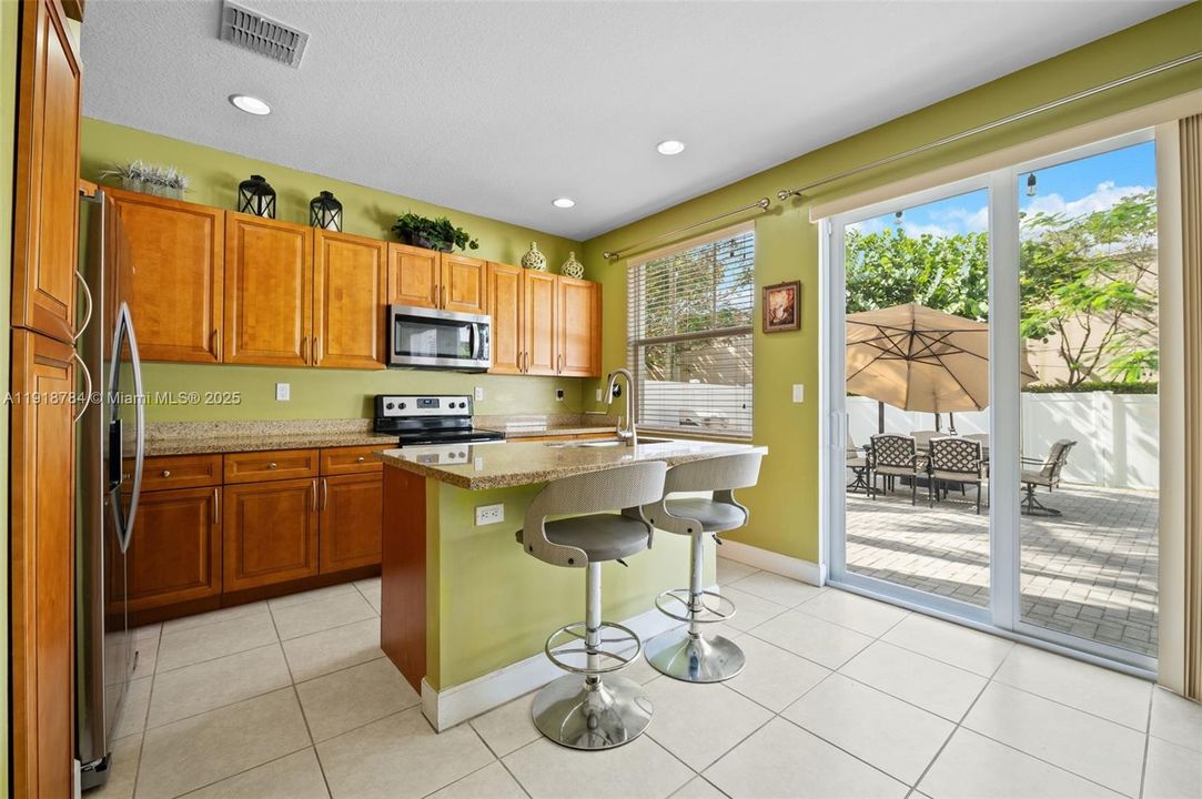 Updated kitchen with tons of counter space—easy to cook, clean, and keep organized.