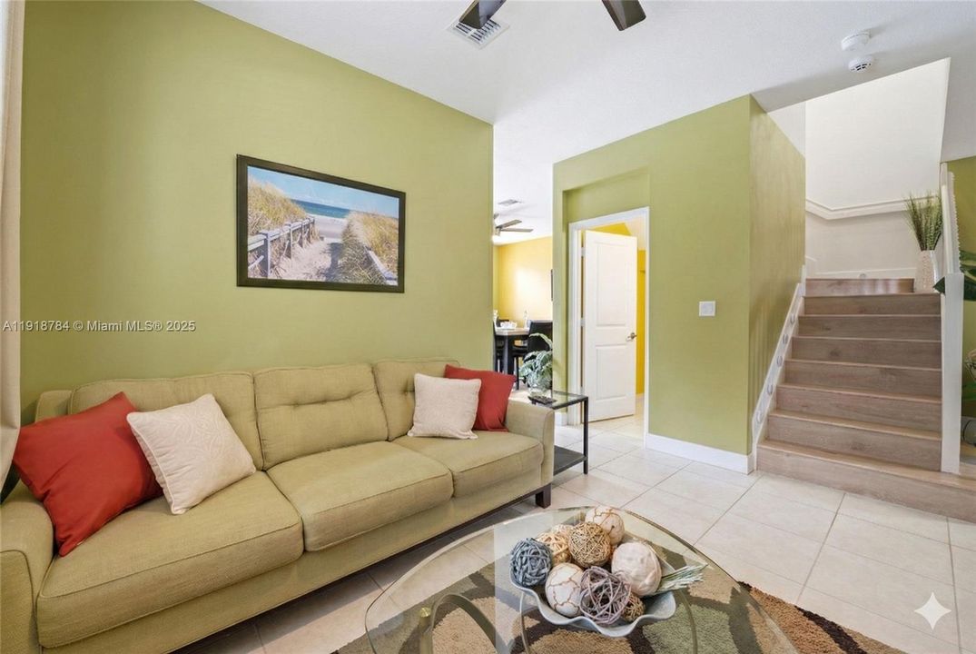 Bright and cozy living room with space to relax, unwind, and entertain