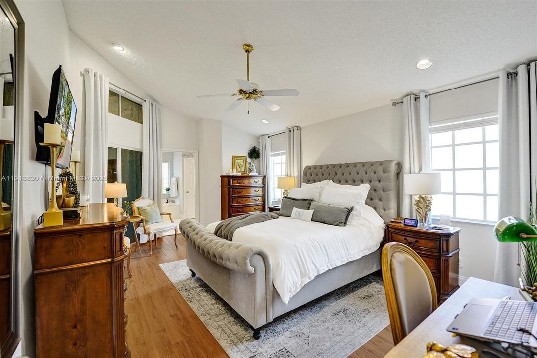 excellent master bedroom suite with walkin closets and en suite bath