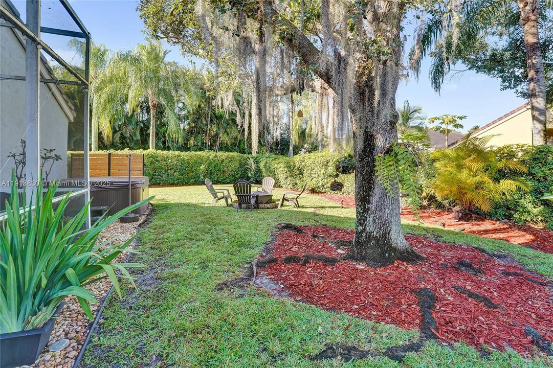 large back yard with a hot tub (hot tub comes with the house!). most of the rear landscaping is handled by the HOA.