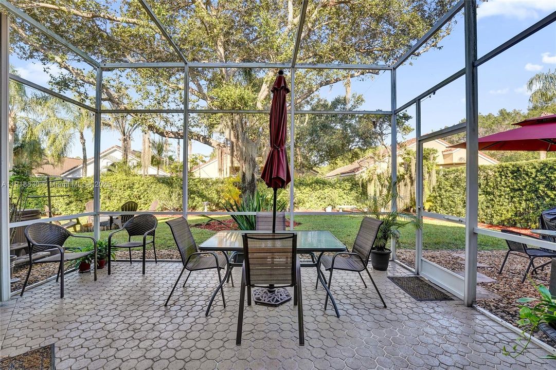 screeened patio, large landscaped lot