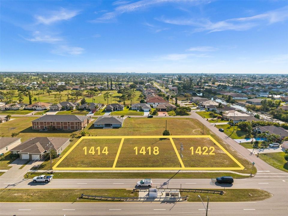 Wide-angle overhead shot of the entire three-lot package.
