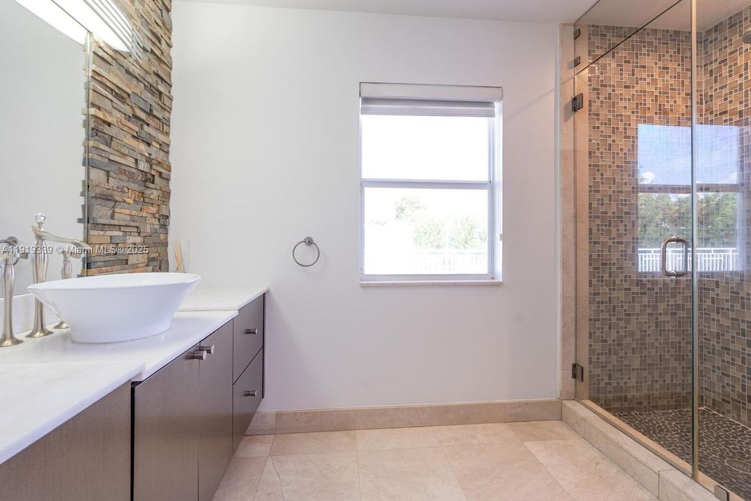 view of the shower of the main bathroom