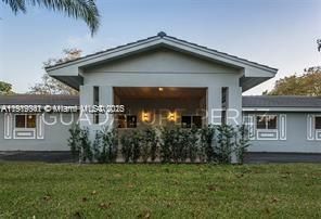 Closer look of the entrance and carport