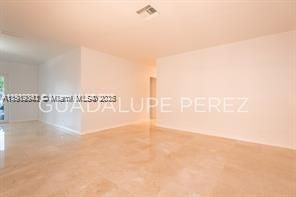 Other angle of the Living area and entrance to rooms