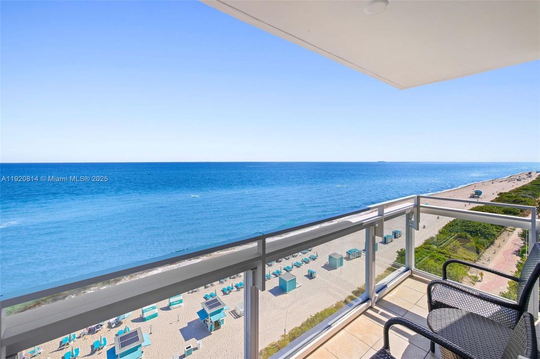 Balcony located off the primary bedroom with unobstructed views of the coastline