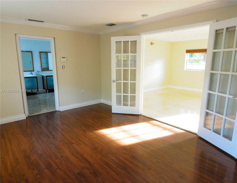 Primary bedroom looking towards the master bathroom.