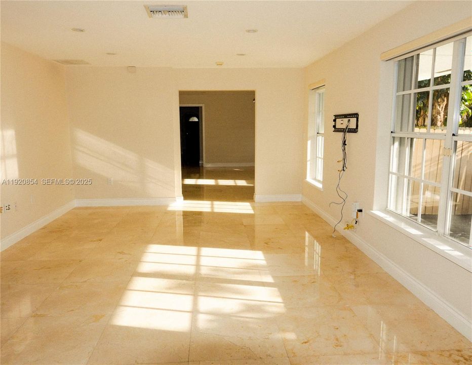 View from the entrance to the family room, dinning, leading to the rooms.