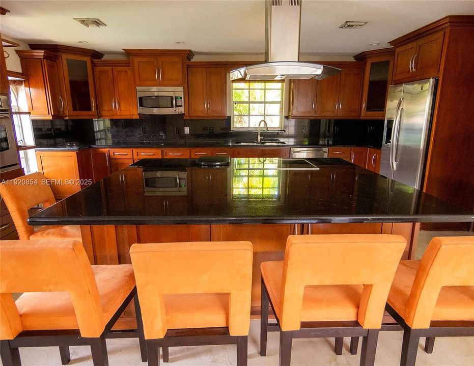 Marble kitchen counter 7 Ft. wide by 6 Ft. long. The five kitchen-counter stools are part of the lease.