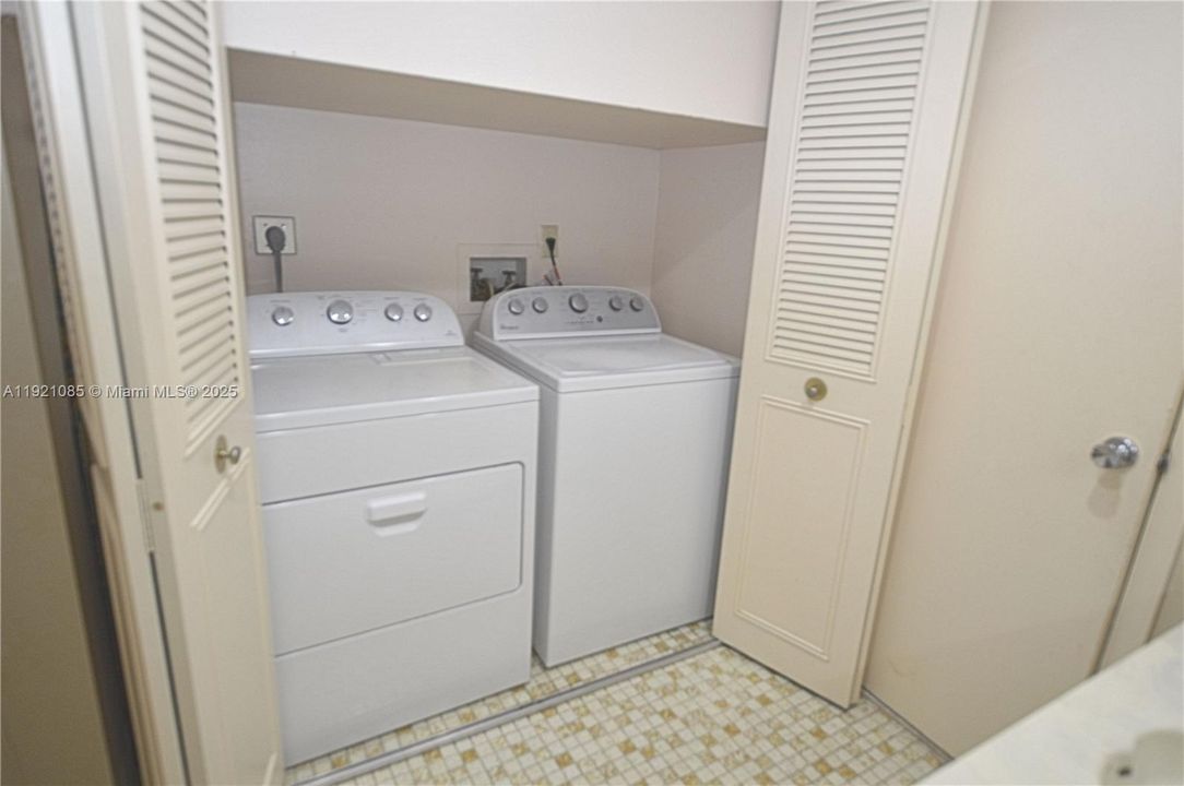 Laundry is within the 1/2 bathroom downstairs
