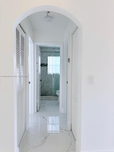 To the second and third bedroom and bathroom