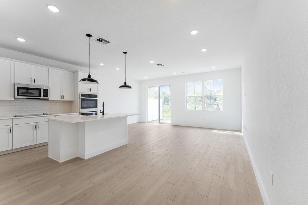 Kitchen, Great Room & Dining Area