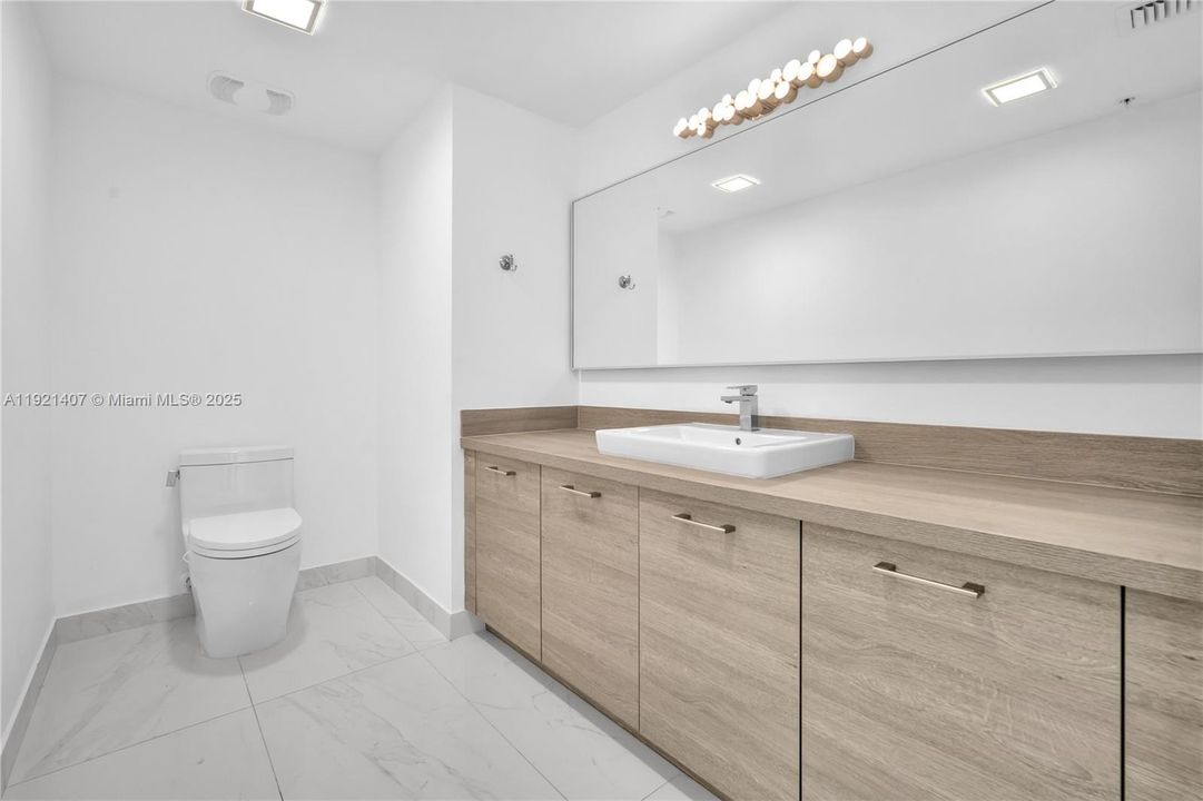 Third 1/2 Bathroom next to the kitchen