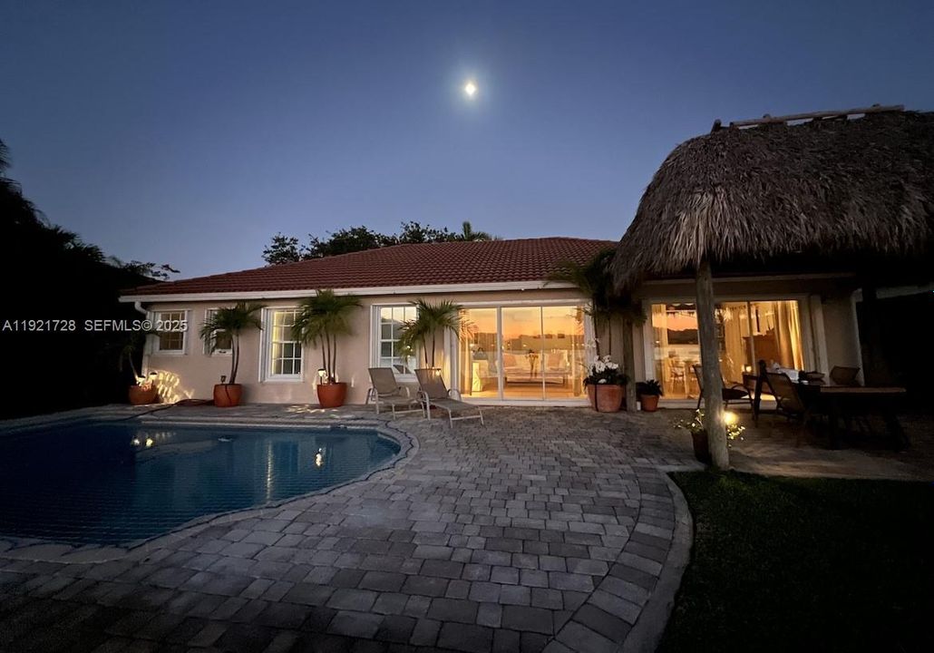 Pool with safety net on. Night view