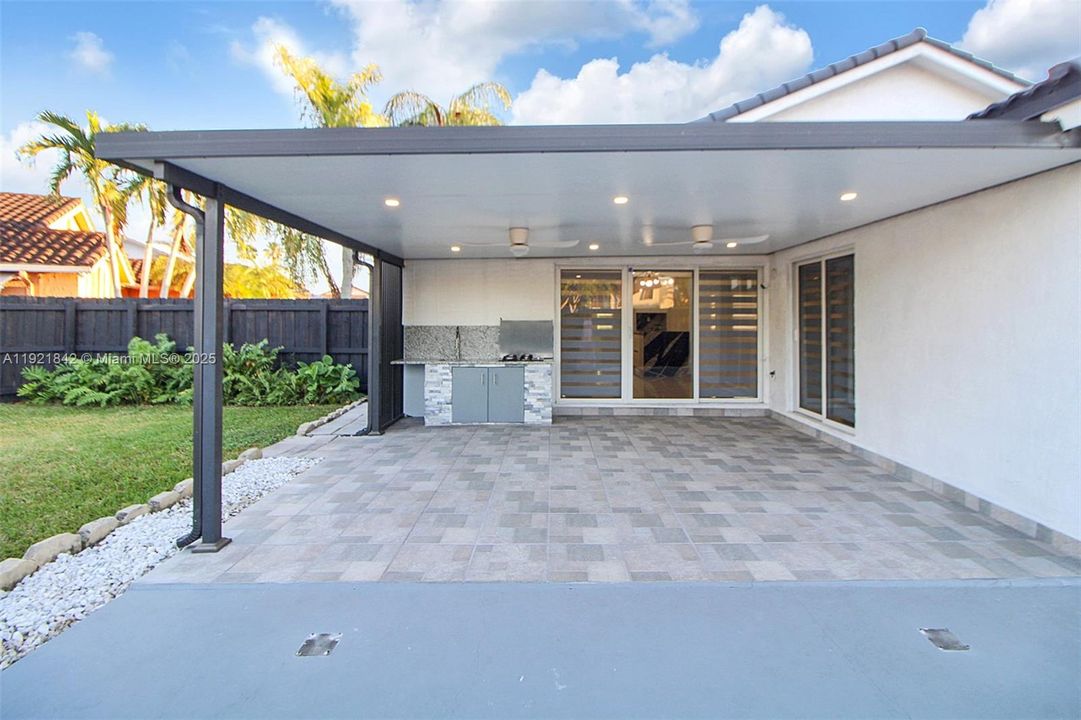 Insulated panels with ceiling fans Summer Kitchen.