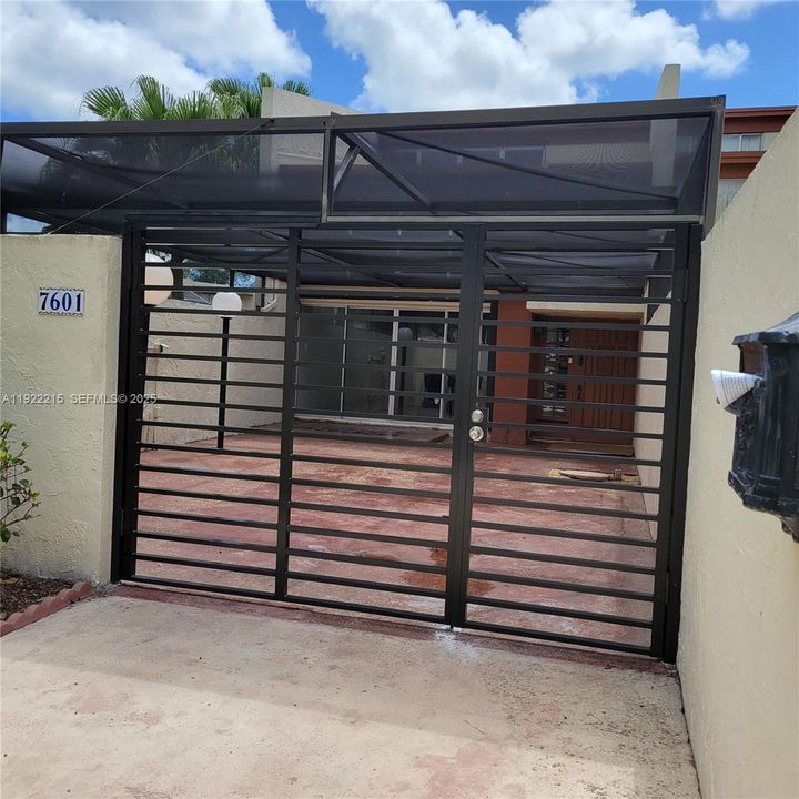 Entrance to parking inside screen area