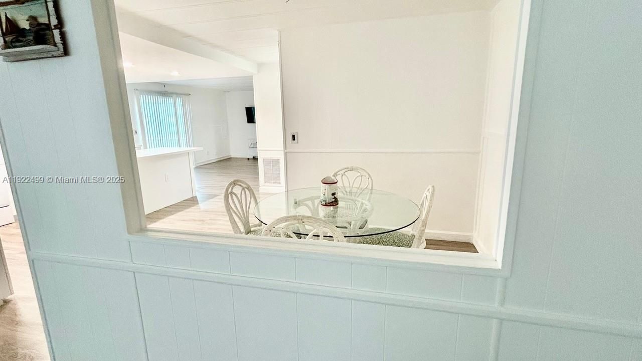 ANOTHER VIEW OF THE DINING ROOM