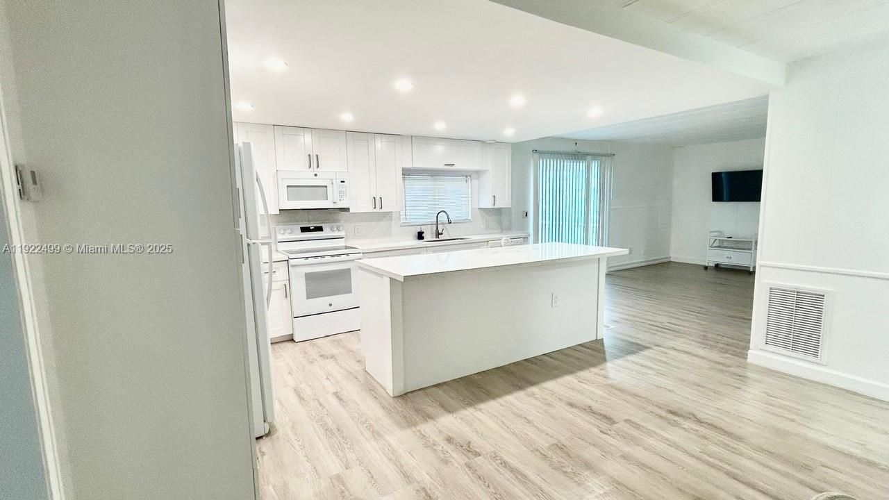 SPACIOUS BRAND NEW KITCHEN , APPLIANCES AND FLOOR