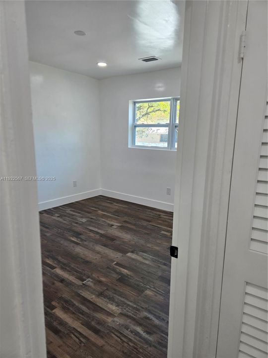 Door Entry to Right Wing Bedroom # 2 facing side of the House