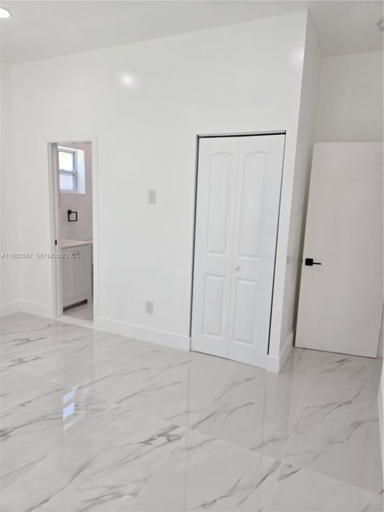 Left Wing Bedroom #1 . Closet and Bathroom shared with Left Wing Bedroom #2