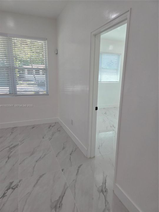 Entry Door to Left Wing Bedroom # 1 facing front of the House