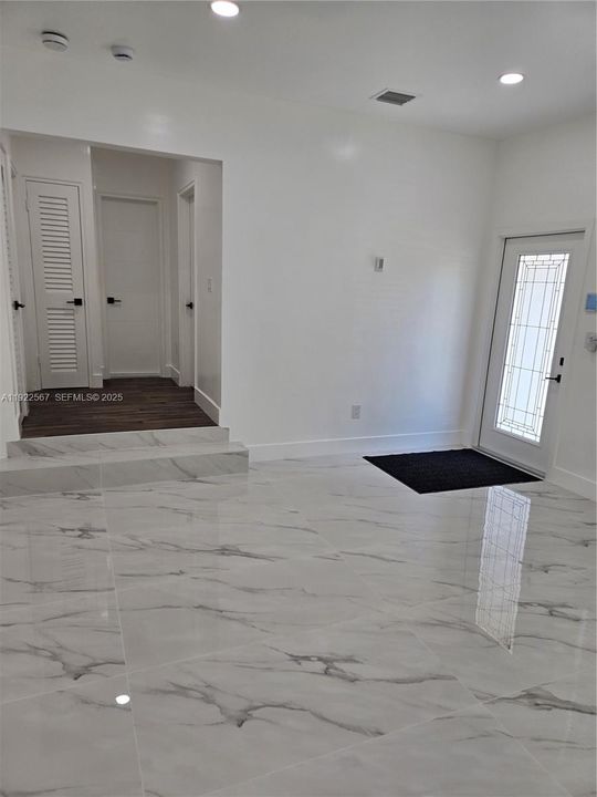 Street Entry Door and Hallway access to Right Wing Bedrooms #1 and #2