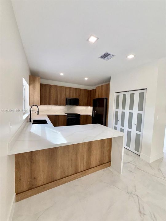 Kitchen with Waterfall Counter