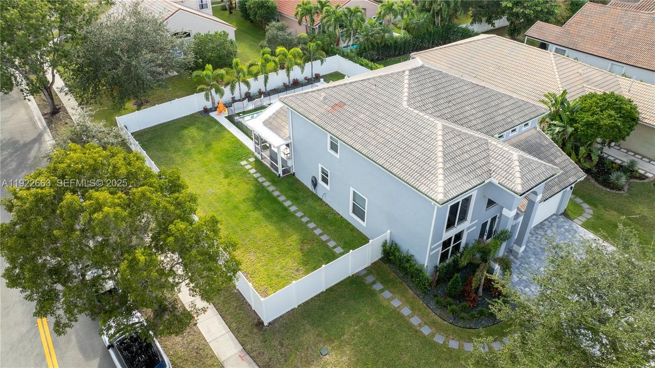 Aerial view side of house and backyard
